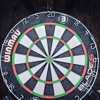 Murphy's Public House - a dart in the center of a dart board - Irish Pub Near Me - Tucson, Arizona