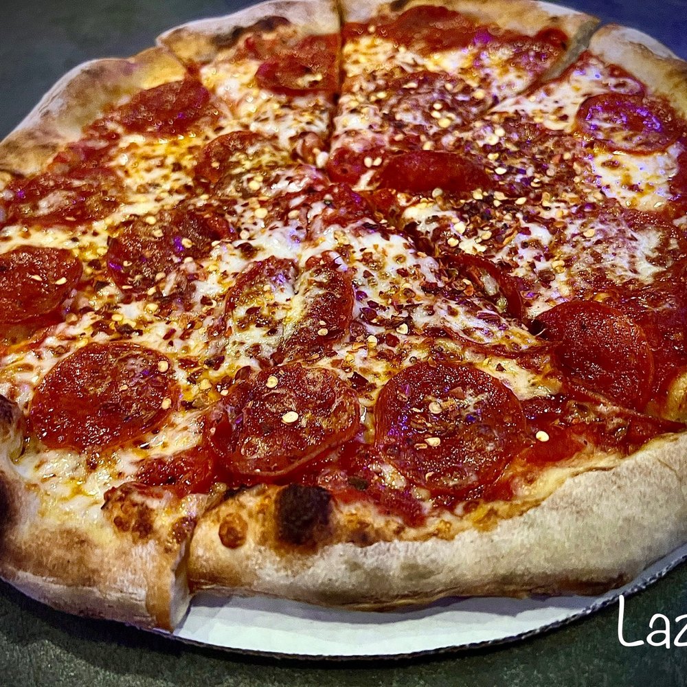 Freak Brothers Pizza - Pepperoni Pizza topped w/Red chili flakes - Pizza Near Me - Phoenix, Arizona Freak Brothers Pizza - Pepperoni Pizza topped w/Red chili flakes - Pizza Near Me - Phoenix, Arizona