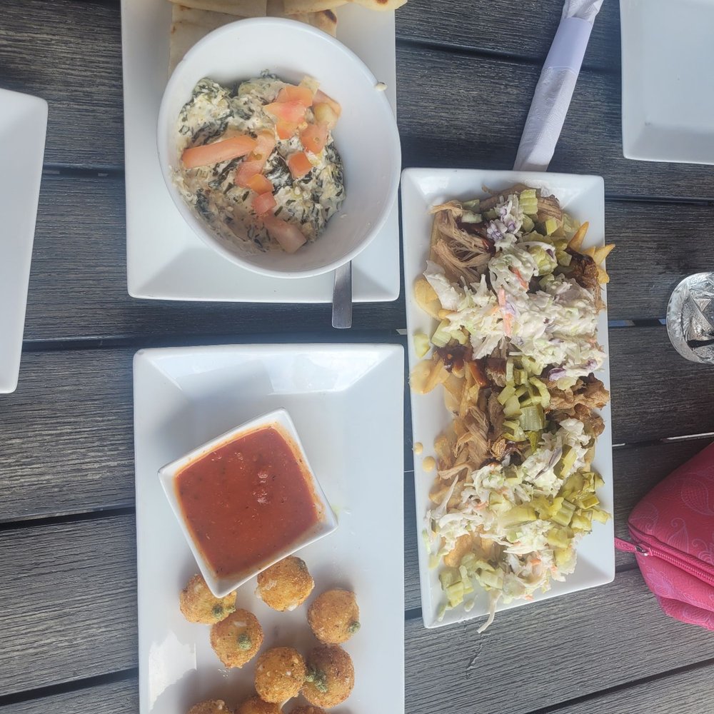 Gopher's Grill - Spinach Artichoke Dip, Mozza Balls, and loaded fries! - Bars Near Me - Effingham, Illinois Gopher's Grill - Spinach Artichoke Dip, Mozza Balls, and loaded fries! - Bars Near Me - Effingham, Illinois