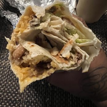 Taqueria's San Jose - A Burrito with just tortilla folded in a way to create an illusion that it's full - Mexican Near Me - Modesto, California Taqueria's San Jose - A Burrito with just tortilla folded in a way to create an illusion that it's full - Mexican Near Me - Modesto, California