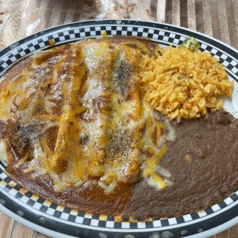 I Love Lucy's Cafe - Cheese enchilada plater with Spanish rice and refried beans - Mexican Near Me - Algoa, Texas I Love Lucy's Cafe - Cheese enchilada plater with Spanish rice and refried beans - Mexican Near Me - Algoa, Texas