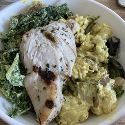 Half chicken bowl with lemon kale and curried cauliflower Half chicken bowl with lemon kale and curried cauliflower