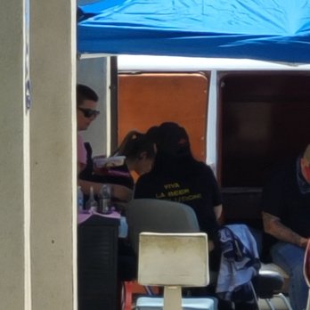 Gearhead Barbershop - Cutting hair outside - Barbers Near Me - Chico, California