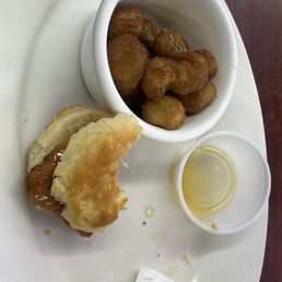 a plate of food and a bowl of dipping sauce a plate of food and a bowl of dipping sauce