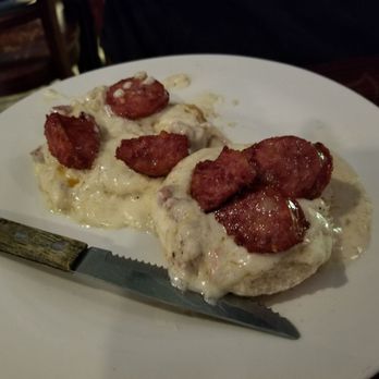 Twelve Mile Limit - Biscuits and gravy with smoked sausage. - Lounges Near Me - New Orleans, Louisiana Twelve Mile Limit - Biscuits and gravy with smoked sausage. - Lounges Near Me - New Orleans, Louisiana