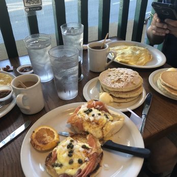 Eggs 'n Things - Left to right: Portuguese Sausage Omelet, Smoked Salmon Eggs Benedict w/ Onion & Capers, Macadamia Nut Pancakes, Ham & Cheese Omelet - Breakfast & Brunch Near Me - Honolulu, Hawaii