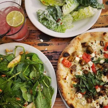 Forge Pizza - The Pink Fang cocktail, Caesar Salad, Cauliflower Pizza, and House Green Salad. - Pizza Near Me - Oakland, California Forge Pizza - The Pink Fang cocktail, Caesar Salad, Cauliflower Pizza, and House Green Salad. - Pizza Near Me - Oakland, California