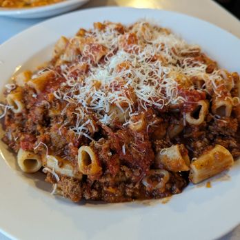 Rino's Place - Bolognese (ground veal, pork, beef cooked slowly in a fresh plum tomato sauce w your choice of homemade pasta - rigatoni) $25 - Italian Near Me - Boston, Massachusetts Rino's Place - Bolognese (ground veal, pork, beef cooked slowly in a fresh plum tomato sauce w your choice of homemade pasta - rigatoni) $25 - Italian Near Me - Boston, Massachusetts