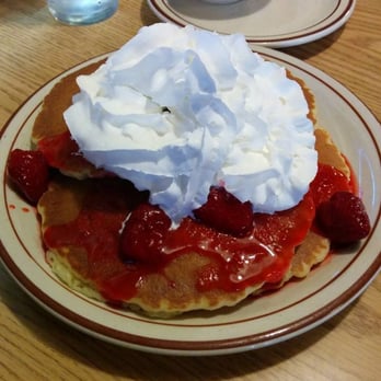 Pancakes R Us - Listed as "Fruit Pancakes". These are the Strawberries & Whip Cream option. Four pancakes in the stack! - Desserts Near Me - Costa Mesa, California