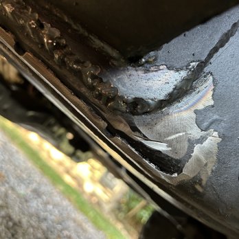 Chambers Auto & Fab - Front passenger cab mount relocate- left my frame like this. Rubber undercoat wipes off with rag. Poop welding, prep, and finish. - Auto Repair Near Me - Candler, North Carolina