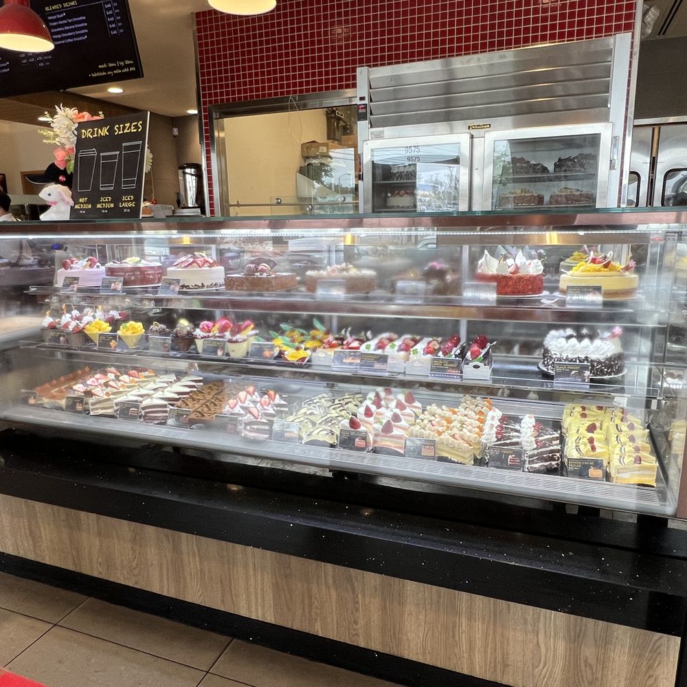85°C Bakery Cafe-Cypress - Refrigerated display case with cakes and other desserts. - Coffee & Tea Near Me - Cypress, California 85°C Bakery Cafe-Cypress - Refrigerated display case with cakes and other desserts. - Coffee & Tea Near Me - Cypress, California
