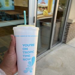 Island Green smoothie and front window signage.