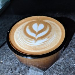 Cappuccino. Note the unique cup. Very heavy glass that feels amazing in the hand. This was a perfect cappo. Cappuccino. Note the unique cup. Very heavy glass that feels amazing in the hand. This was a perfect cappo.