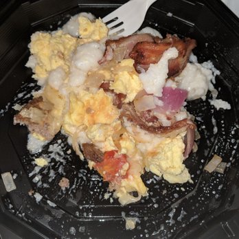 Cora's - Was creative and the other half of my burrito I unwrapped and mixed with the grits. The delicious flavor of the burrito helped the grits. - Bars Near Me - Biloxi, Mississippi