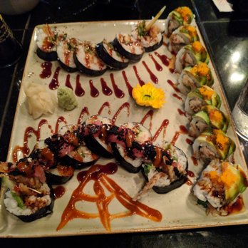Three's Bar & Grill - Shrimp tempura role (top), green dragon role (right), black widow role (bottom). - Asian Fusion Near Me - Kihei, Hawaii