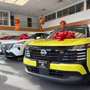 Route 17 Nissan - view of 3 Nissan vehicles on the showroom floor of Route 17 Nissan - Car Dealers Near Me - Hasbrouck Heights, New Jersey Route 17 Nissan - view of 3 Nissan vehicles on the showroom floor of Route 17 Nissan - Car Dealers Near Me - Hasbrouck Heights, New Jersey