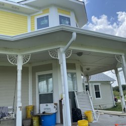 Riley's Seamless Gutters - Round Downspouts to accent Victorian Home