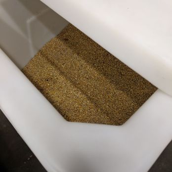 Red Fork Distillery - a white toilet with sand in it - Distilleries Near Me - Tulsa, Oklahoma