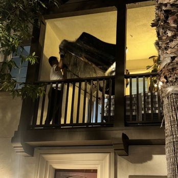 Proper Moving  - Oversized couch over balcony - Movers Near Me