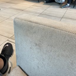 Chair in lounge, needs some updating. Chair in lounge, needs some updating.