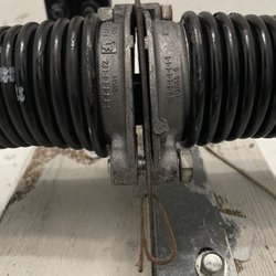 First Priority Garage Doors - Replacement of springs and bolts were left out causing gap as it is under strain