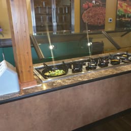 Salad bar, lettuce plus 11 options, 4 dressing choices