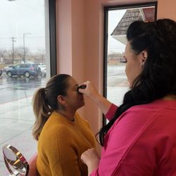 Bree Maquillage - The owner and makeup artist, Brianna, doing a clients makeup.