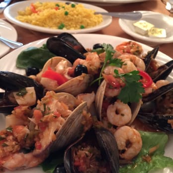 Tero's Restaurant - Seafood salad - broiled salmon in the background. - Seafood Near Me - Lyndhurst, New Jersey