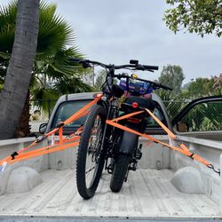 Harbor Freight Tools - Cam buckles straps worked very well to transport ebikes.