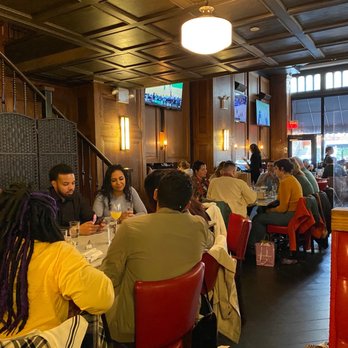 Pennsylvania 6 NYC - a group of people eating at a restaurant - Bars Near Me - New York, New York Pennsylvania 6 NYC - a group of people eating at a restaurant - Bars Near Me - New York, New York