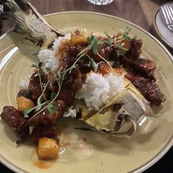 Farsides Brossard - The chicken dish. They use an actual pineapple for presentation but use canned pineapple for the meal.