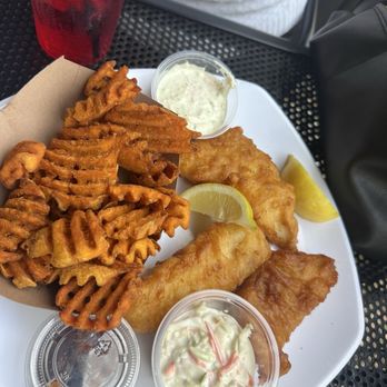 South Lyon Hotel - Fish and chips with sweet potato fries - Bars Near Me - South Lyon, Michigan South Lyon Hotel - Fish and chips with sweet potato fries - Bars Near Me - South Lyon, Michigan