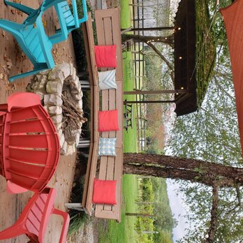 Traveler's Cellar Winery - colorful chairs and fire pit - Wineries Near Me - Rockfield, Kentucky