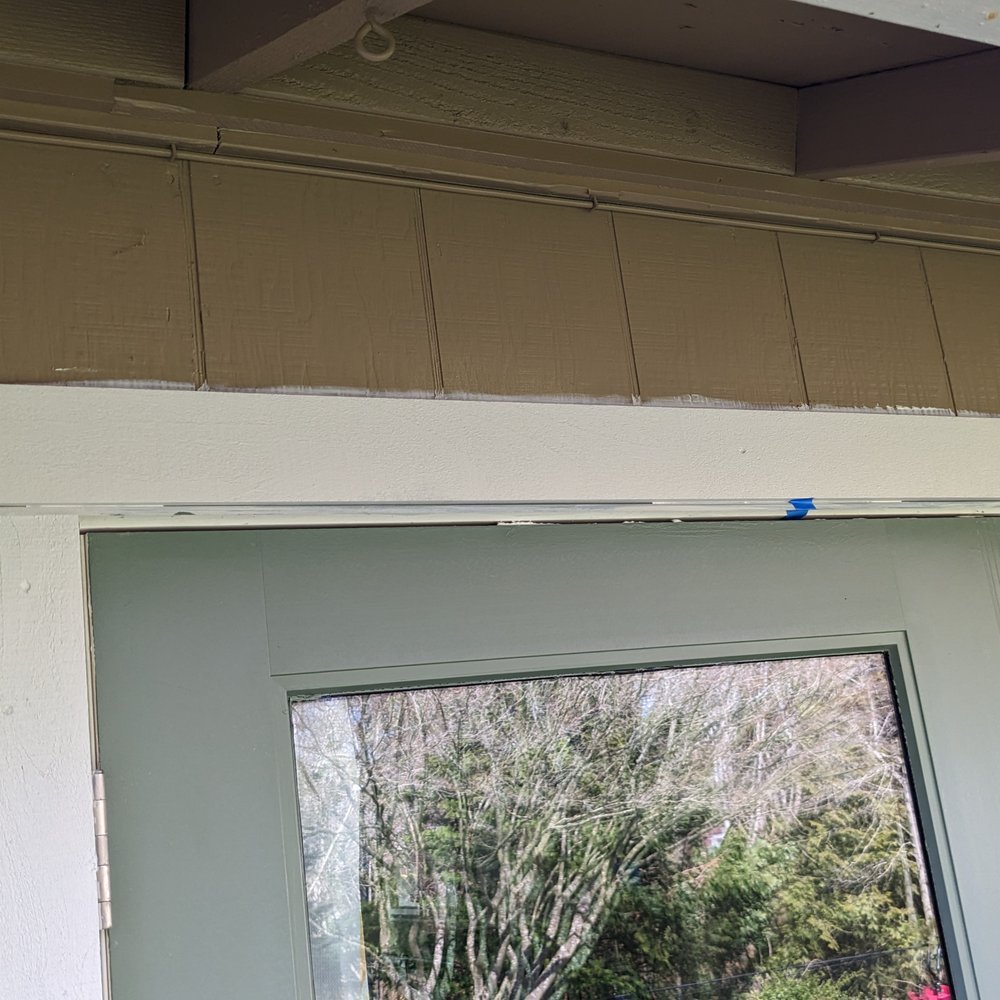 Spruce Box Construction - Trim paint above new patio door has been left on siding - no touch up. - General Contractors Near Me - Tigard, Oregon