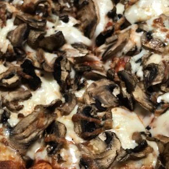 Fratello's Pizza - Close up of the mushroom pizza - Pizza Near Me - Parma Heights, Ohio Fratello's Pizza - Close up of the mushroom pizza - Pizza Near Me - Parma Heights, Ohio