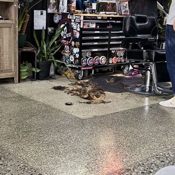 Old 99 Barber Shop - A barber and a large pile of hair - Waxing Near Me - Bellingham, Washington Old 99 Barber Shop - A barber and a large pile of hair - Waxing Near Me - Bellingham, Washington