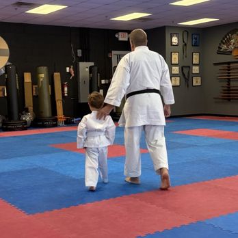 Stoneybrook Karate - Sensei Tim showing my son around the dojo - Karate Near Me - Winter Garden, Florida Stoneybrook Karate - Sensei Tim showing my son around the dojo - Karate Near Me - Winter Garden, Florida