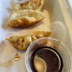 Half eaten dumplings, 6 dumplings for $4.95, a very exceptional price for San Diego right now haha.