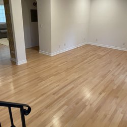 The Floor Center - Refinished maple floors. Before, this floor had huge gaps. Ray and his team filled the gaps, sanded the floors and added a clear stain