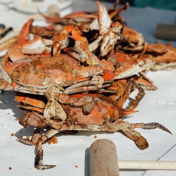 Quarterdeck - a pile of crabs on a table - Seafood Near Me - Arlington, Virginia