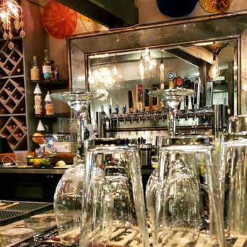 MOSAIC Restaurant - wine glasses on a bar - New American Near Me - Richmond, Virginia