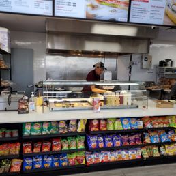 a counter with a variety of food items