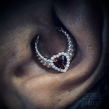 Black Lotus Tattoo Gallery - Daith piercing - Piercing Near Me - Hanover, Maryland Black Lotus Tattoo Gallery - Daith piercing - Piercing Near Me - Hanover, Maryland