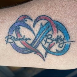 My wife and i designed the tattoo and Paulie made it awesome!!!