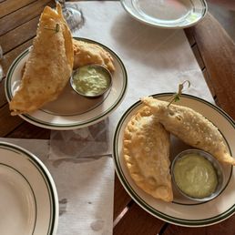 Empanadas de Ropa Vieja (2) and Chicken Empanadas (2) Empanadas de Ropa Vieja (2) and Chicken Empanadas (2)