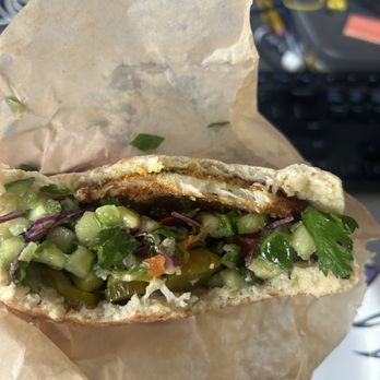 Taboonette - Crispy Chicken Schnitzel Pita - Mediterranean Near Me - New York, New York Taboonette - Crispy Chicken Schnitzel Pita - Mediterranean Near Me - New York, New York