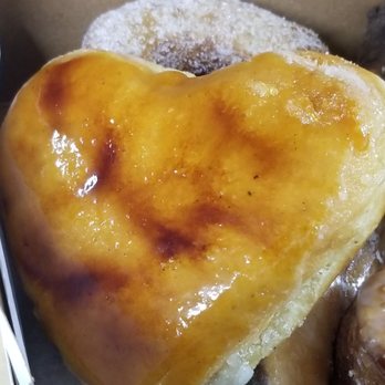 Knead Donuts & Tea - Creme Brulee donut (I got it unfilled) - good! Hint: eat it right after purchasing, don't wait because sugar crust will not be crunchy. - Donuts Near Me - Long Beach, California Knead Donuts & Tea - Creme Brulee donut (I got it unfilled) - good! Hint: eat it right after purchasing, don't wait because sugar crust will not be crunchy. - Donuts Near Me - Long Beach, California