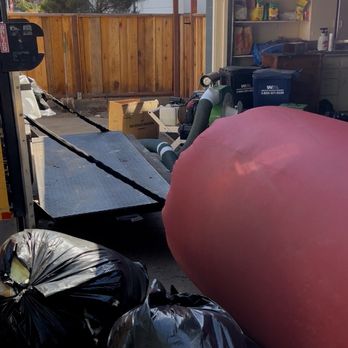 Chris's Insulation Services - Chris and his team removed all the insulation and then use this giant red vacuum to suck out all the rodent droppings. - Air Duct Cleaning Near Me