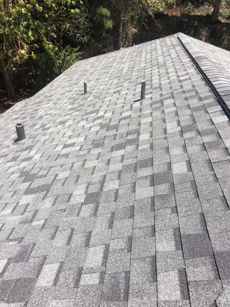 Slide of New Era Roofing