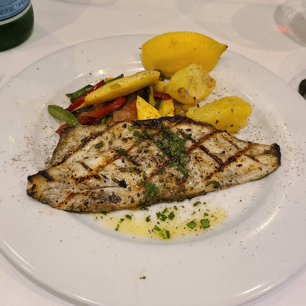 Cucina Paradiso - Special grilled bass fish split in two - Italian Near Me - Petaluma, California Cucina Paradiso - Special grilled bass fish split in two - Italian Near Me - Petaluma, California